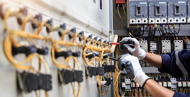 Professional Electrical Panel Upgrade technician working in Nassau County County, FL